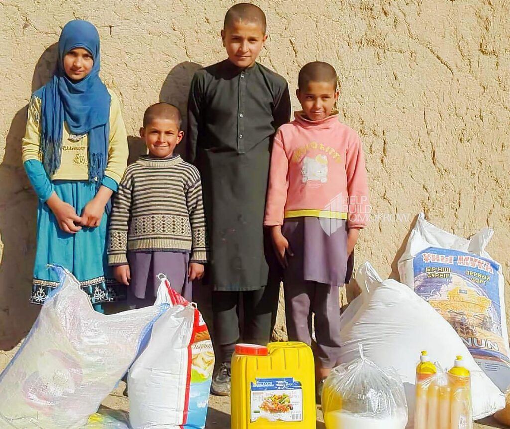 A HBT Sponsored Family Receiving Food Package